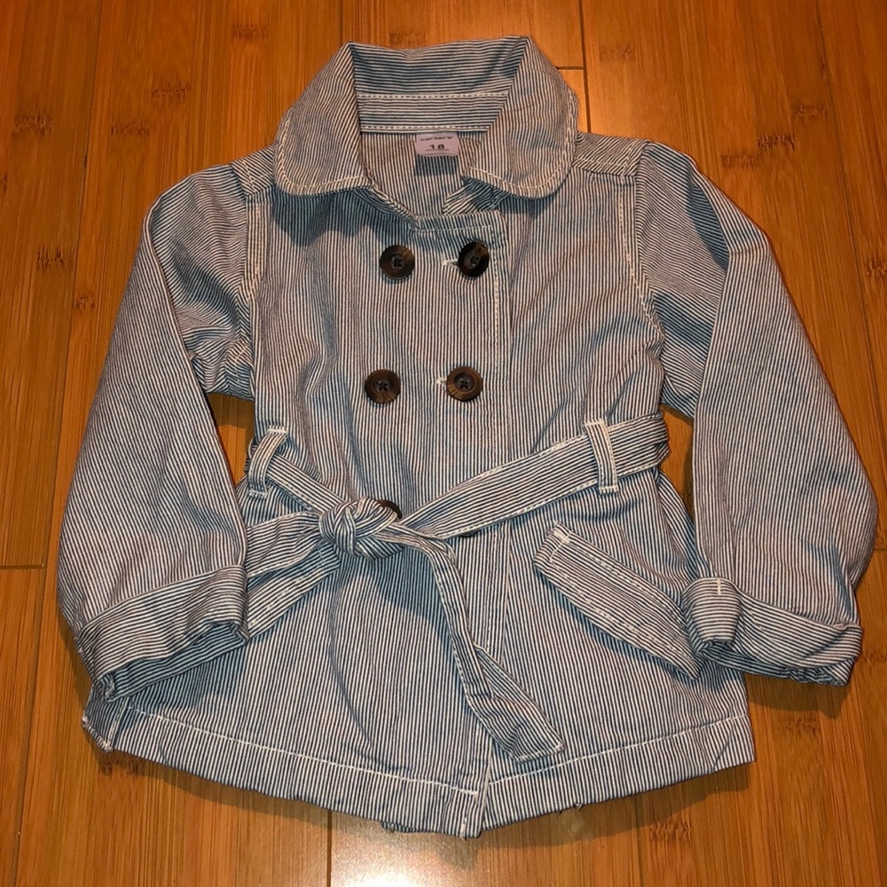 Blue and white striped trench coat